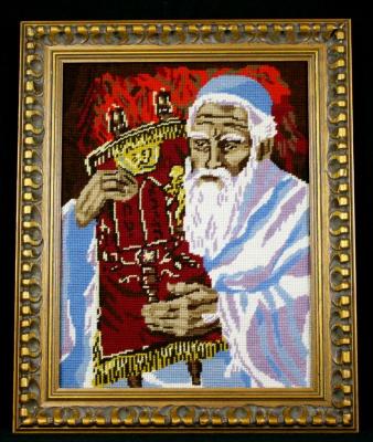 Portrait of a Rabbi Holding a Torah, done in needle point