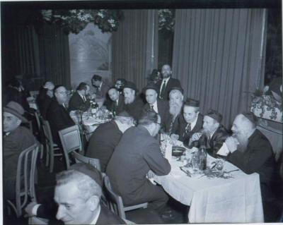 Rabbi Eliezer Silver Seated at an Unidentified Wedding with Unidentified Rabbanim
