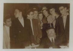 Rabbi Eliezer Silver (seated) Surrounded by a Group of Teenage Boys